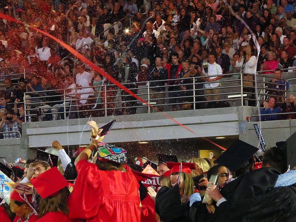 A chaotic and colorful scene breaks out at Doc Harris Stadium after all the graduating Camas High School seniors received their diplomas Friday.