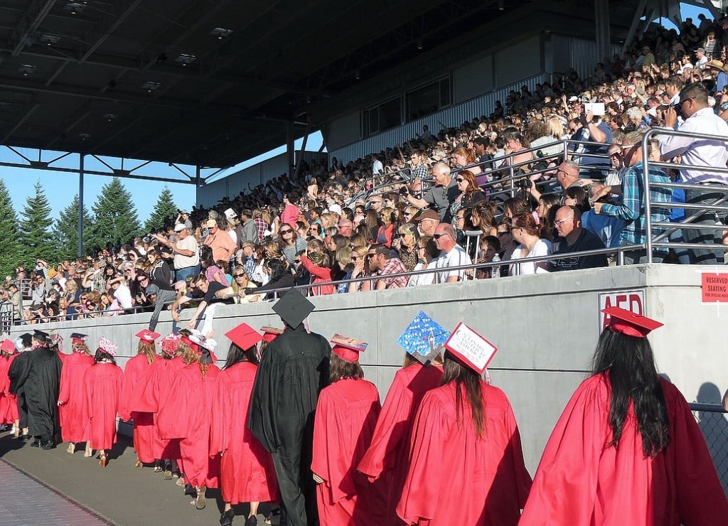 The Papermaker class of 2015 marches into Doc Harris Stadium Friday to begin the graduation ceremony.