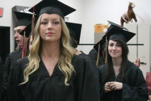 Excelsior High School students eagerly await the start of the commencement ceremony Friday.