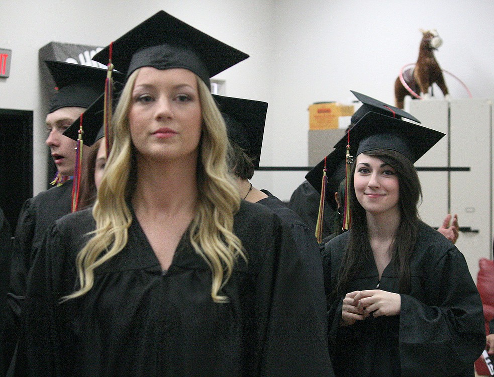 Excelsior High School students eagerly await the start of the commencement ceremony Friday.