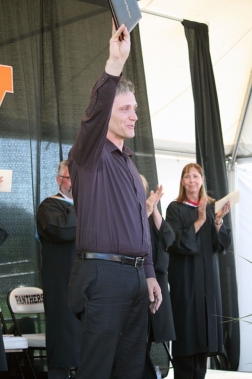 Washougal School District Superintendent Dawn Tarzian presented Kyle Eakins with an honorary WHS diploma case. After attending WHS in the late 1980s, Eakins graduated from Silverton Union High School in 1990, because his family moved to Silverton. He has served as chair of the Washougal Citizens for Better Schools Committee, president of the Washougal Schools Foundation, and he was a member of the WHS Turf Campaign. Eakins is head coach for the Canyon Creek and Jemtegaard middle school wrestling teams, and an assistant coach at WHS.