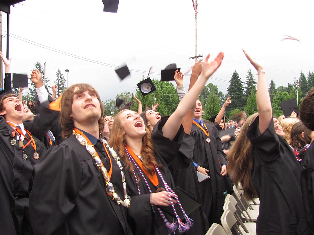 Members of the WHS Class of 2014 threw their graduation caps into the air, at the conclusion of the commencement ceremony.