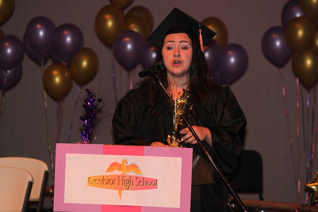 Audrey Sibley performs "When I'm Gone," during Excelsior High School graduation ceremonies at the Washburn Performing Arts Center.  There were 19 students in the  2013 graduating class.