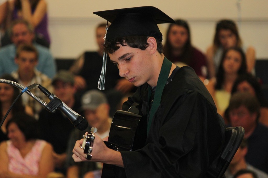 Hayes Freedom graduating senior Nicholas Bacon performs during the commencement ceremony on Saturday.