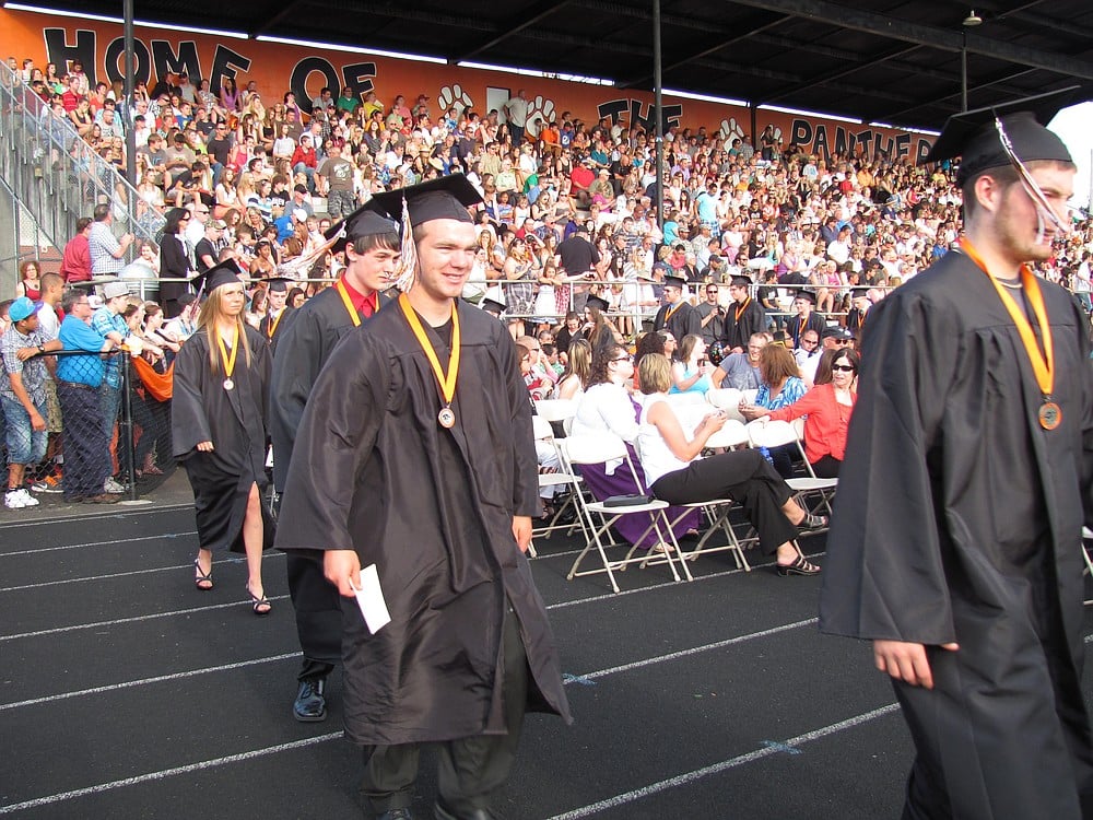 Excited seniors walk to the stage to get their diploma cases, as friends and family look on from the stands. The WHS class of 2013 featured 181 graduates.