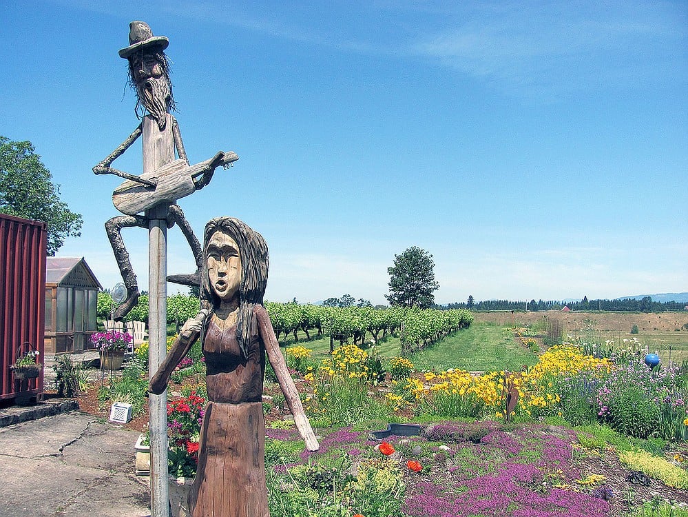 Gail English's gardens at English Estate Winery include art by Scott Kluka, of Washougal, a gazing globe, as well as a variety of colorful flowers and views of Mt. St. Helens. A seating area near the garden invites visitors to sit and stay awhile.