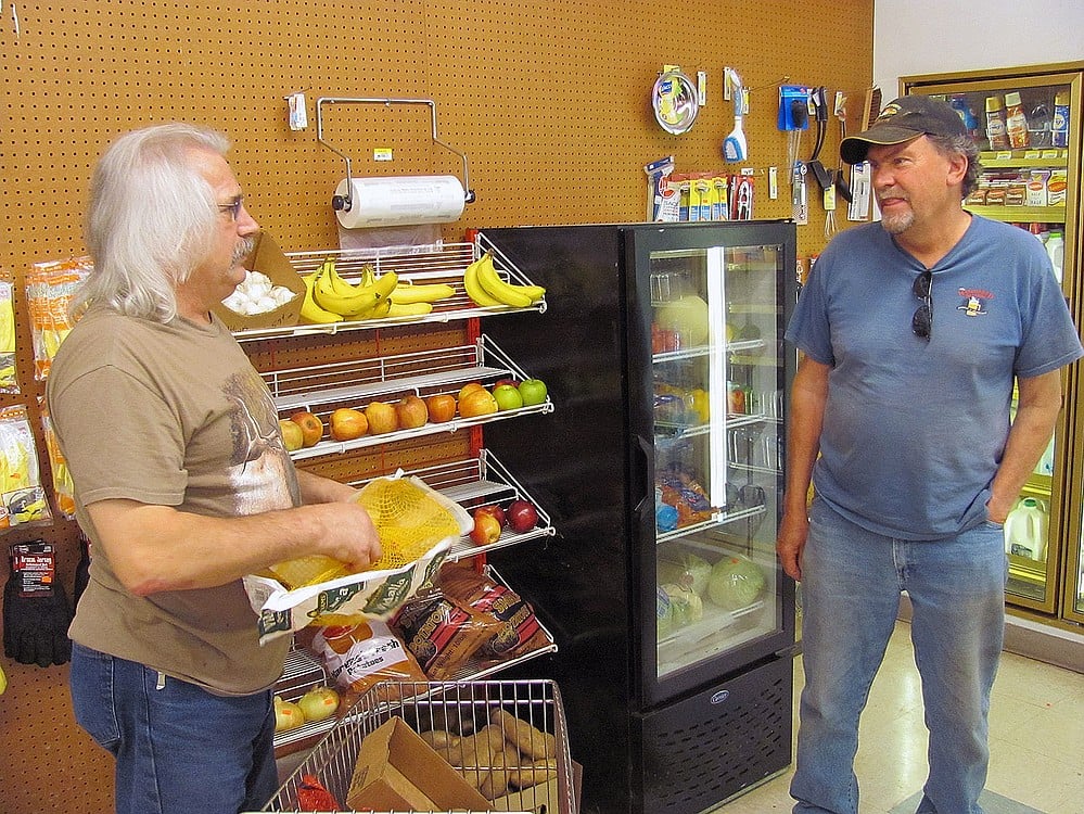 Marcus Fuller (left), one of the owners of the Washougal River Mercantile, is also a gunsmith. Ammunition, hunting knives, orange vests and elk and bear lure are available to purchase, along with rafts and fishing, painting, car care, plumbing and hardware supplies.