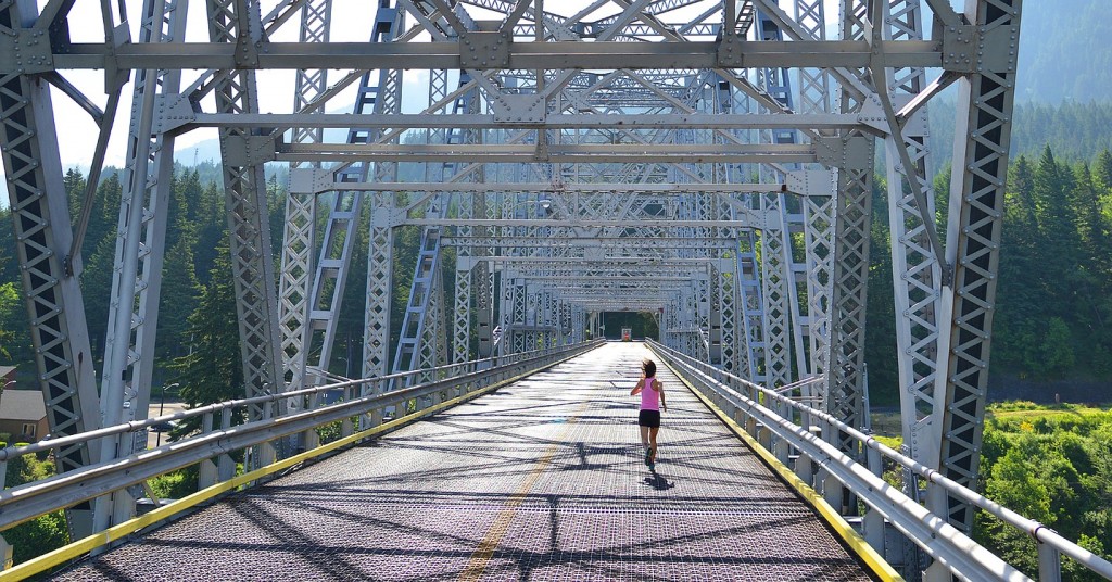 The Bridge of the Gods Half Marathon and 10K races begin with a breathtaking sprint across the Columbia River from Washington into Oregon. The bridge stretches 1,858 feet across and stands 140 above the river. The grated road allows runners and walkers to see the rushing water below their feet.