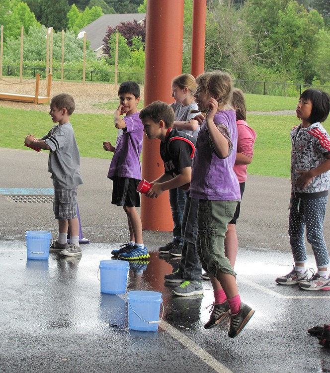 Schools use several methods to encourage students to exercise. Here, children at Grass Valley Elementary participate in a game during field day.