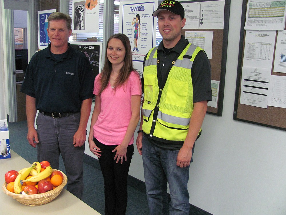 Georgia-Pacific Safety Manager Jeff Uthe, Human Resource Generalist Sabrina Little and Safety Supervisor Vance Dostert (left to right) are among the Camas mill employees involved in leading health and safety efforts. Little coordinates the mill's health and wellness fair, while Dostert oversees the safety fair. He is also co-chairman of the mill's ergonomics committee. Ergonomics involves topics such as lifting techniques and reducing repetitive motions and overreach of tools.