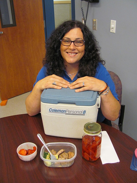 Sherry Montgomery, a code enforcement officer, often brings her lunch to work at the Washougal Police station. Recently, her meal included leftover steak, parmesan-roasted zucchini, local strawberries and fruit-infused water. "I brown bag my lunch everyday and eat as few processed items as possible,"