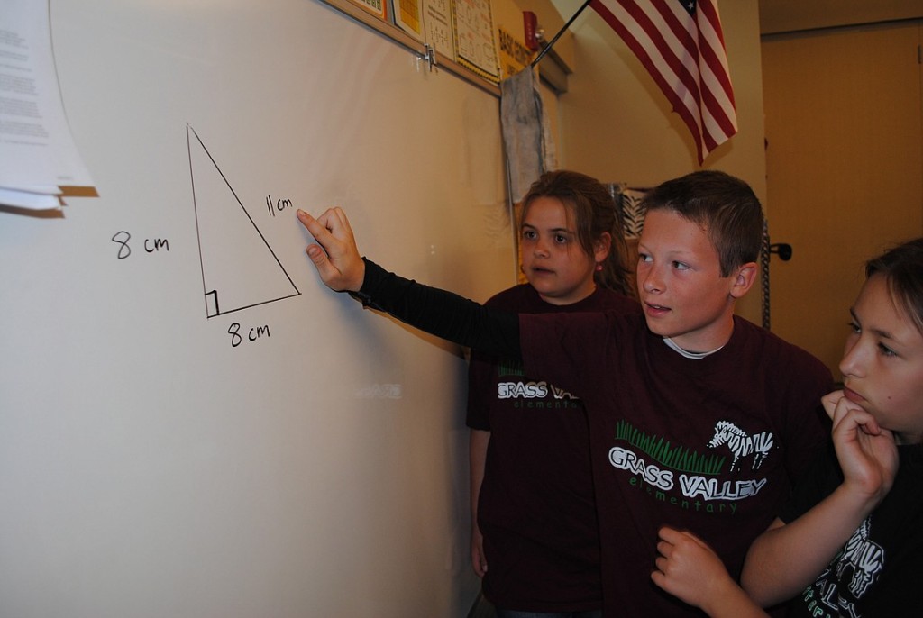 Megan Bauer, Tyler Forner and Alexis Howard practice geometric concepts during math team practice at Grass Valley Elementary.