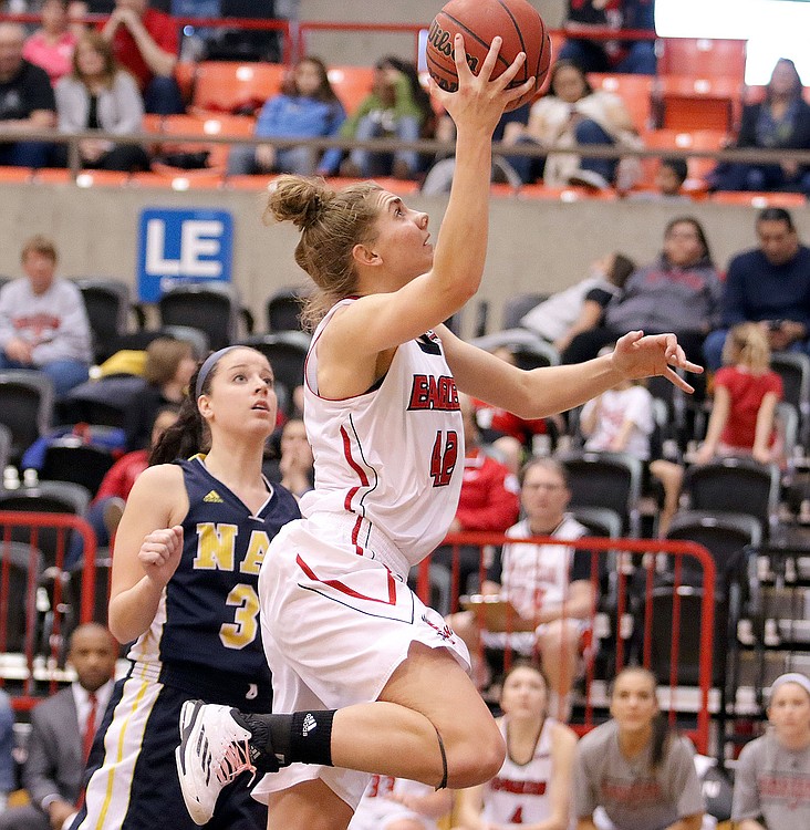 Eastern Washington University Eagle Melissa Williams drives to the basket during a game against Northern Arizona Feb. 21. In the 73-42 win at home for EWU, she recorded her third consecutive double-double as the Eagles won their sixth straight game. Williams, a 2011 CHS graduate, recently completed her college basketball career at EWU, an effort that culminated with a scholar athlete award.