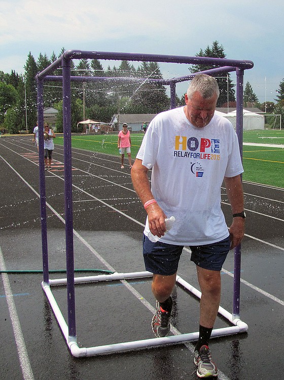 A water mister and several fans were set up at Fishback Stadium, by Washougal High School, to help cool off participants of the Relay for Life of East Clark County. Approximately 300 individuals helped raise $58,885 for the American Cancer Society. Event Chairwoman Mandy Dunn said there were no heat-related emergencies. "We kept everyone as cool as we could and happy," she said.