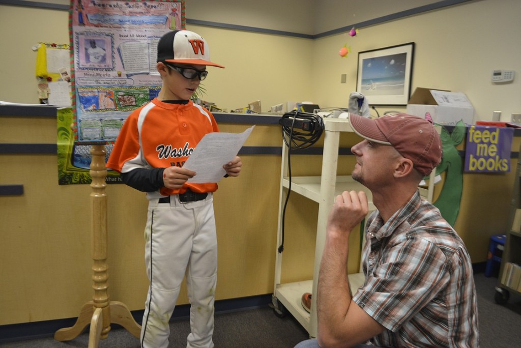 Samuel Evers researched baseball legend Jackie Robinson for his famous person. Here, he gives a speech about him during the Famous Person Museum.