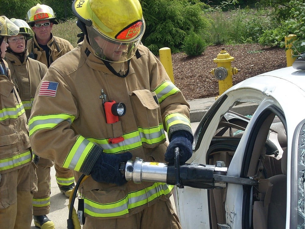 Citizens Academy students cut a car apart using auto extrication equipment. "Most people know very little about firefighters -- and the actual services that they provide," said ECFR Chief Scott Koehler.