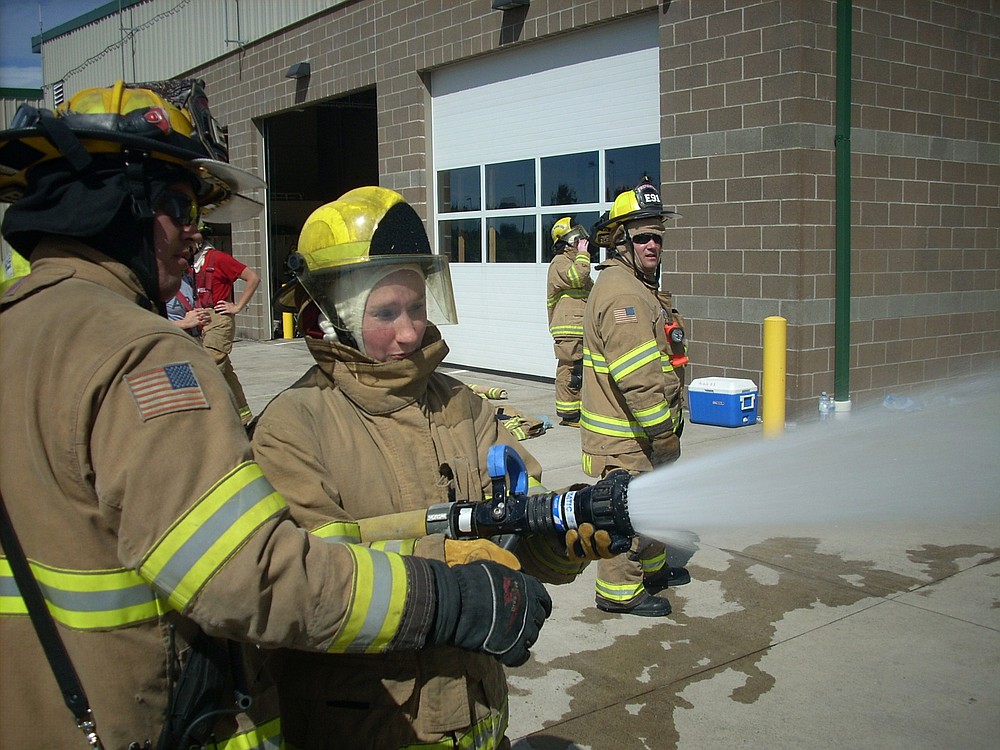 Photos courtesy of ECFR
A ECFR Citizens Academy participant works to extinguish a "live" vehicle fire. The academy gave citizens the opportunity to get an up-close and personal look at a day in the life of a firefighter.