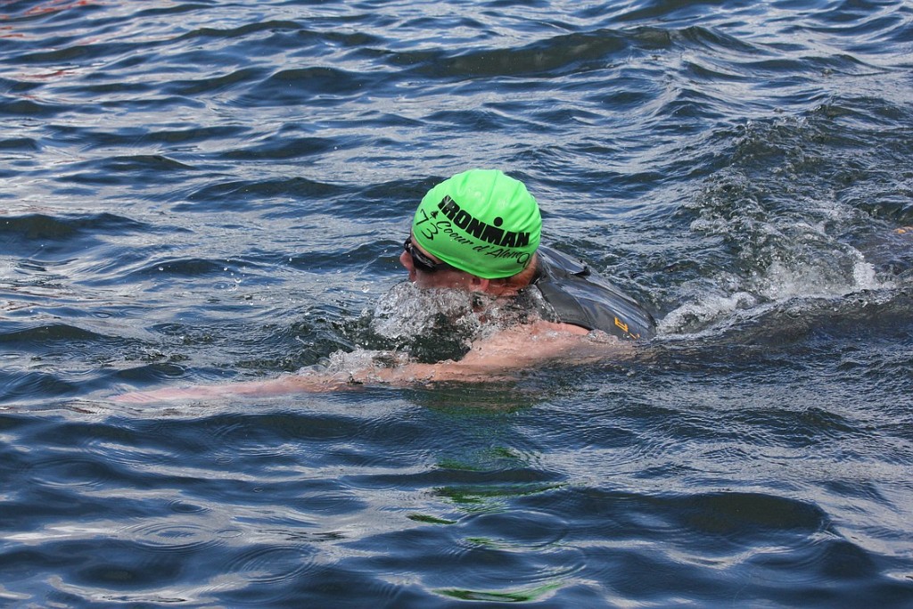 Washougal's Nathan Milojevic swims through Lake Coeur d'Alene to begin the Ironman Coeur d'Alene June 23. He completed the 2.4-mile swim, 112-mile bike ride and 26.2-mile run in 13 hours, 39 minutes and 51 seconds.