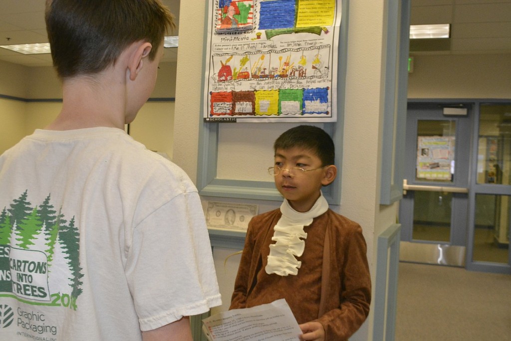 Eric Choi explains what made Benjamin Franklin famous during the annual event at Gause Elementary.