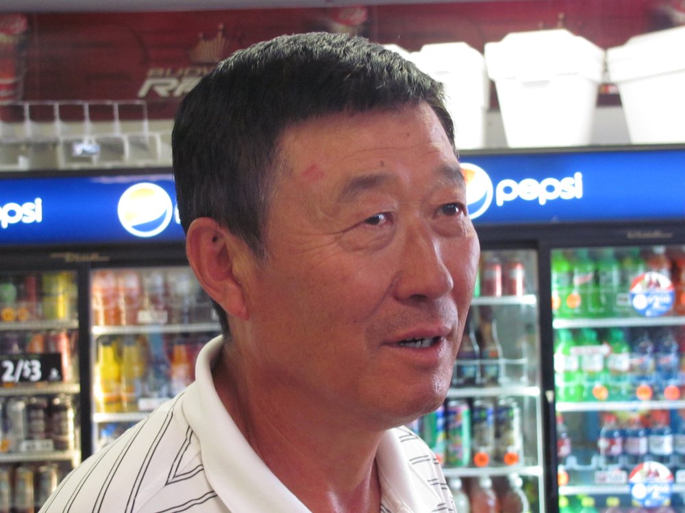 The owner of 7 Market, Nam Yang, sustained an abrasion and a bump on his head, during an armed robbery at his convenience store Wednesday morning. The suspect hit Yang on the head with the wood handle of an ax, after Yang said he did not have any money. Yang refused medical treatment.