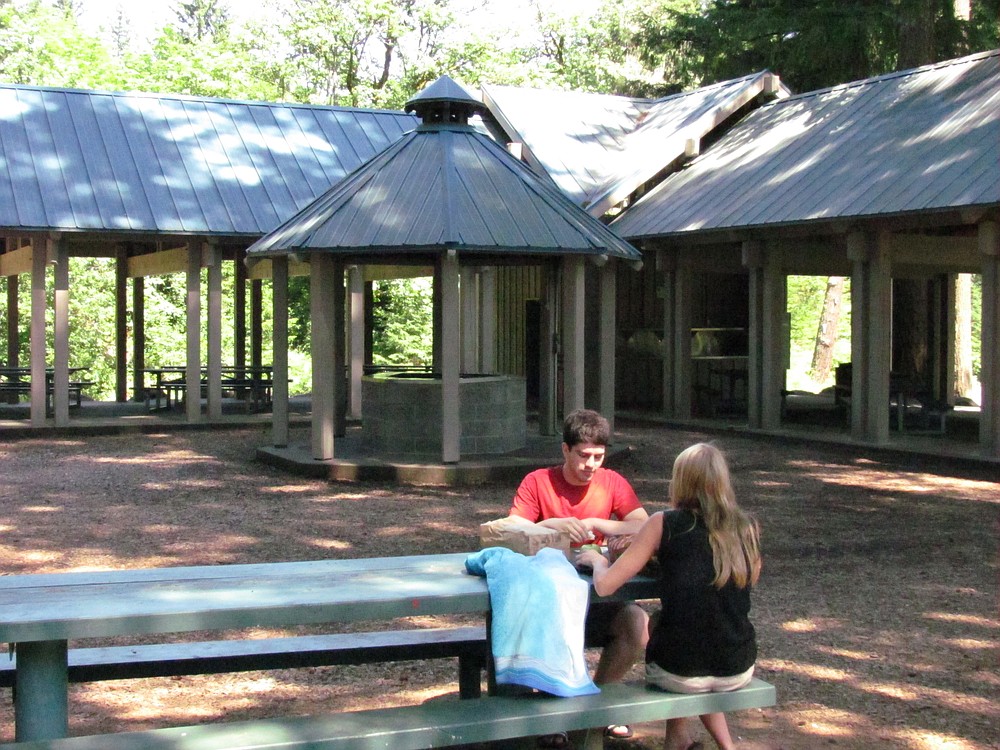 Dining in the shade at one of the area's many parks, such as Fallen Leaf Park in Camas, is one way for those without air conditioning to eat without sweltering in the kitchen.