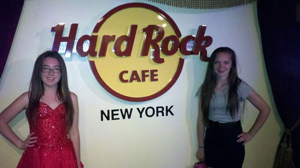 Courteney Webb and Taylor Billups pose at the Hard Rock Cafe in New York City. They and other students from Jemtegaard and Canyon Creek middle schools toured the East Coast last month with Jemtegaard history teacher Scott Rainey.