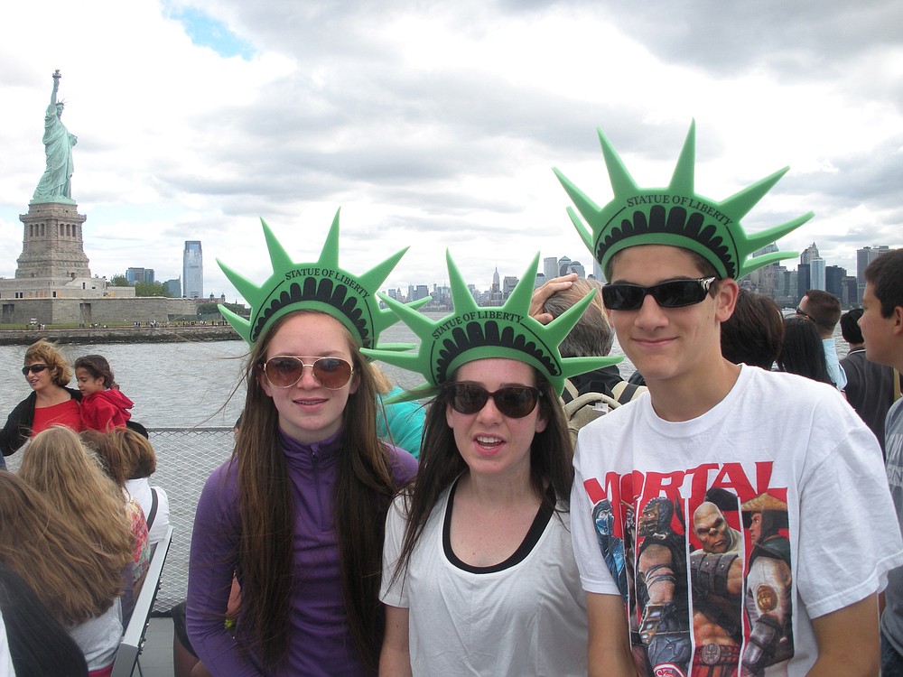 Taylor Billups, Courteney Webb and Matthew Rotundo pose for the camera in New York City.
