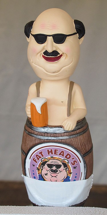 This decorative beer tap handle was at the Fat Heads booth. The brewery, from Portland, was among the more than 20 local and regional participants at the Weird Beer festival.