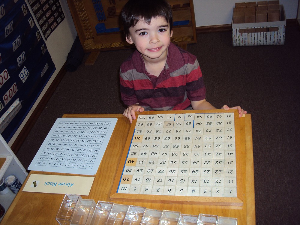 Abram Black, 6, participates in a math lesson at Camas Montessori. Children are in mixed age classrooms, which helps them to develop communication skills and learn to work together, administrator Donna Hargrave says.