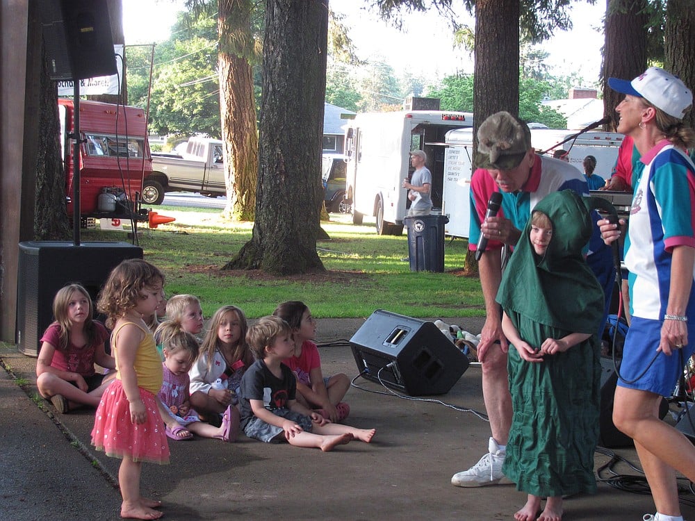 The Rockaroos, a popular kid's band, perform for young concert goers Wednesday night at Crown Park.