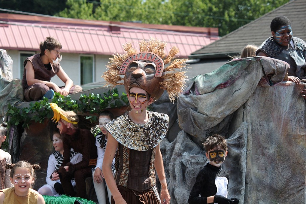 Members of Christian Youth Theatre dressed up in elaborate costumes worn during their recent performance of "Pridelands." The group belted out a number of tunes as they walked the parade route on Fourth Avenue from Oak to Adams street.