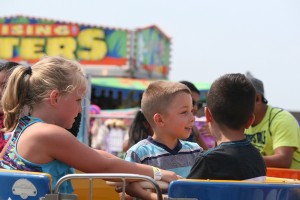 Young attendees enjoy one of the many rides during opening day Friday at the Clark County Fair . It will continue through Aug. 10 with activities for all ages.