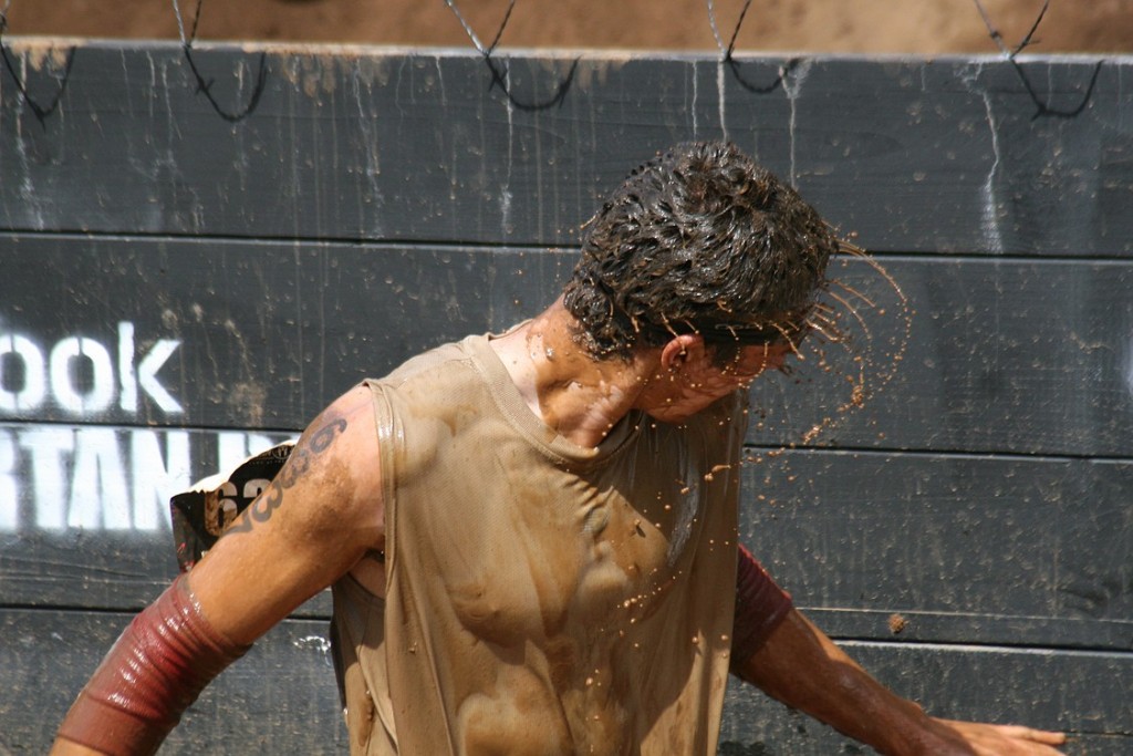 A competitor shakes the mud out of his hair during the Spartan Sprint. More than 10,000 warriors earned medals after conquering a series of punishing obstacles designed to test the human spirit.