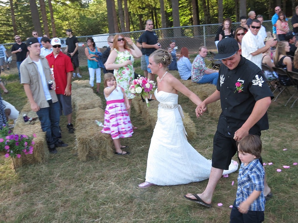 Jamie and Kory walk down the aisle together after becoming man and wife.