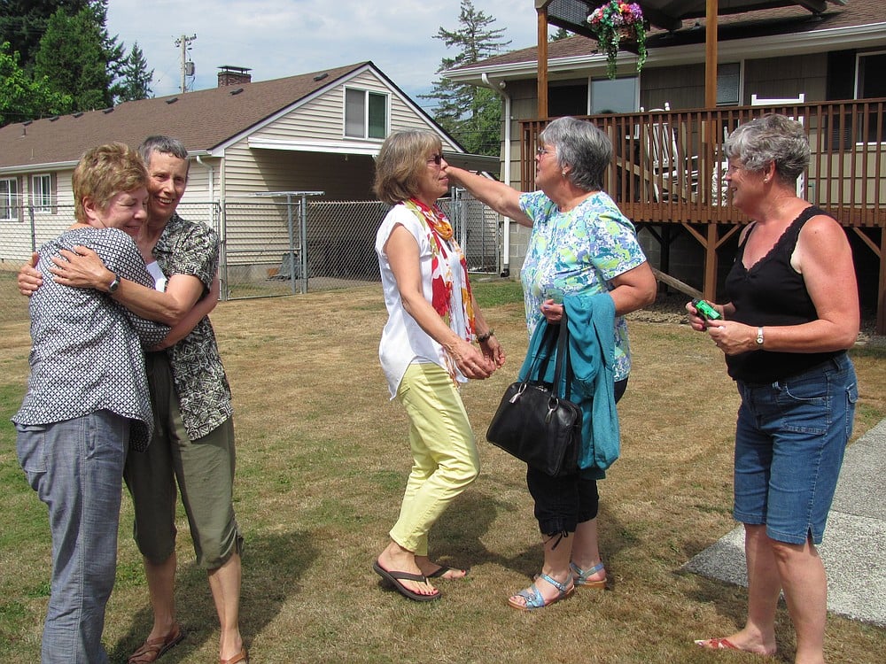 The former classmates greeted each other with hugs and laughter. They included Jan "Bailey" Whitehead, Terry "Cleaver" Hoogesteger, Beth "Zollo" Klaas, Cynthia "Burns" Shaw and Kooky "Ritter" Helland (from left to right).