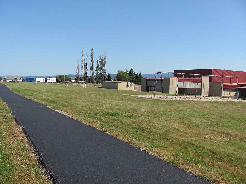 Thanks to the efforts of and contributions from the Camas School District and Parent Teacher Associations, students at Helen Baller Elementary School and Dorothy Fox Elementary School (above) will have access to new paved walking paths starting this fall.