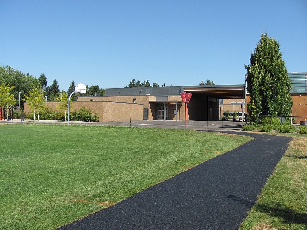 The new walking path at Helen Baller Elementary School (above) will complement its goal-setting track program.