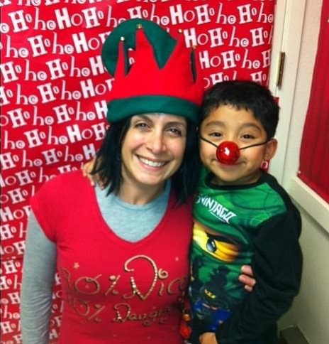 Marilyn Goodman loved spending time with her son, Jhestin. Here, they share a silly moment during a holiday party.