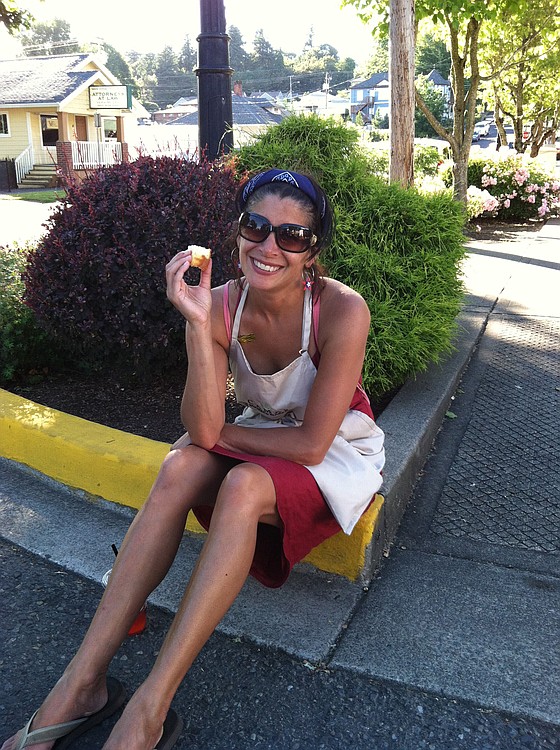 Marilyn Goodman enjoys a treat during the Camas Farmer's Market in 2013. She served as the coordinator until her passing earlier this month.