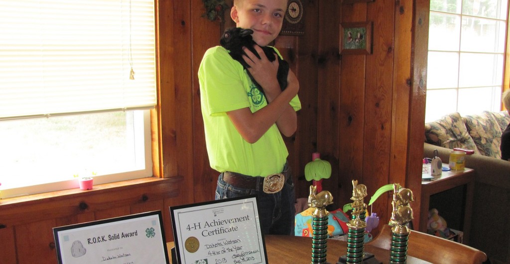 Dakota Watson of Camas holds his Polish rabbit, Prince. He has been active in the Washougal-based 4-H R.O.C.K.S club for four years, and has won several awards.