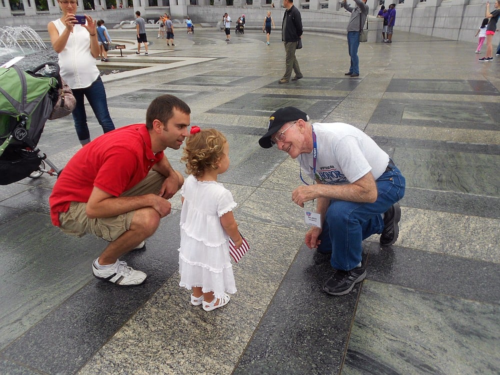 Wilbert Kalmbach, a World War II veteran, encountered a 2-year old girl with her parents at the WWII Memorial, in Washington, D.C. She told him, "Thank you for serving," and her father said, "These are the veterans I told you about, remember?"  Kalmbach is a retired Camas paper mill employee.