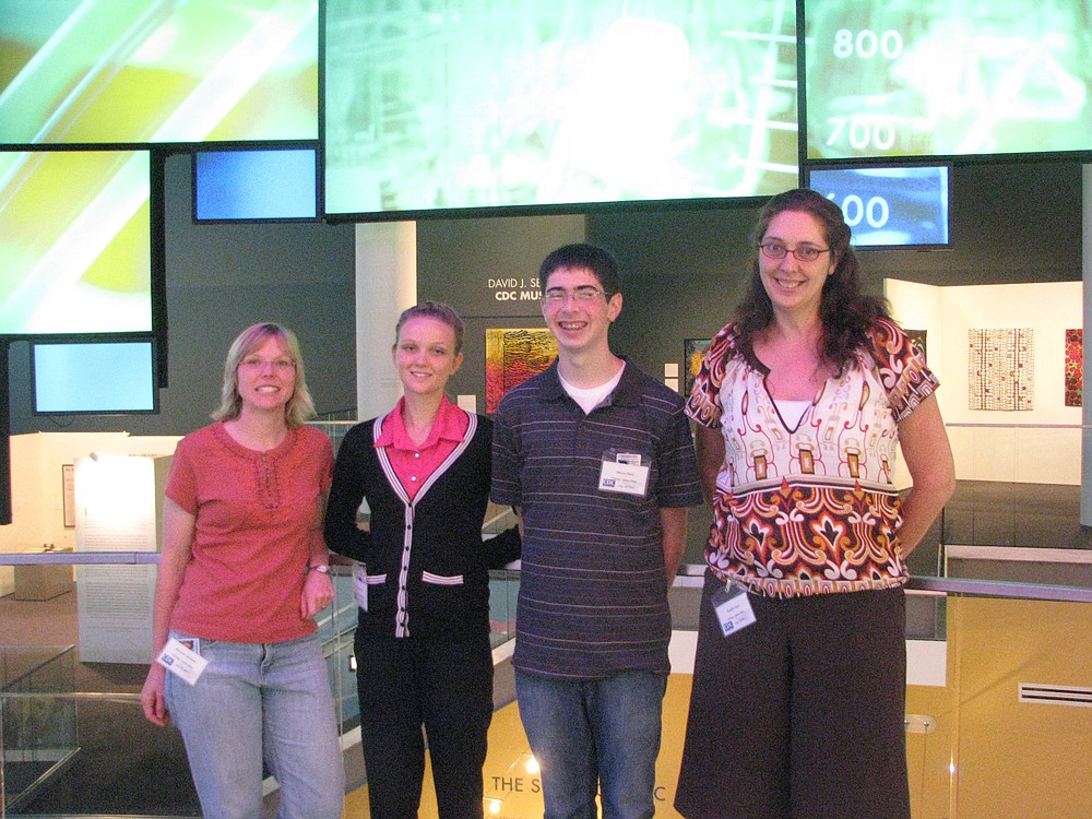 From left, Brianna Abraham, Rachel Fadlovich, Marcus Bintz and Jennifer Dean pose for a photo at the Centers for Disease Control and Prevention  in Atlanta.