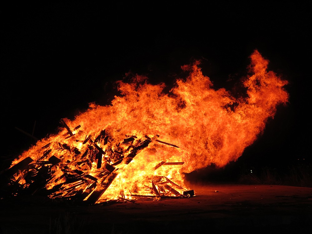 At 8:30 p.m. Wednesday, members of the Camas-Washougal Fire Department ignited a large pile of kindling at the former Hamblton Brothers Lumber Mill property, at Second and "A" streets.