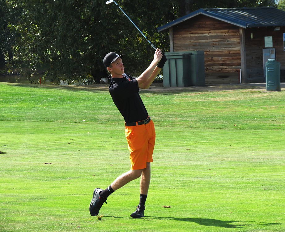 Bryce Samwel watches his approach shot land about a foot away from the 18th hole. The Washougal High School senior finished in fifth place at the Jeff Hudson Invitational.