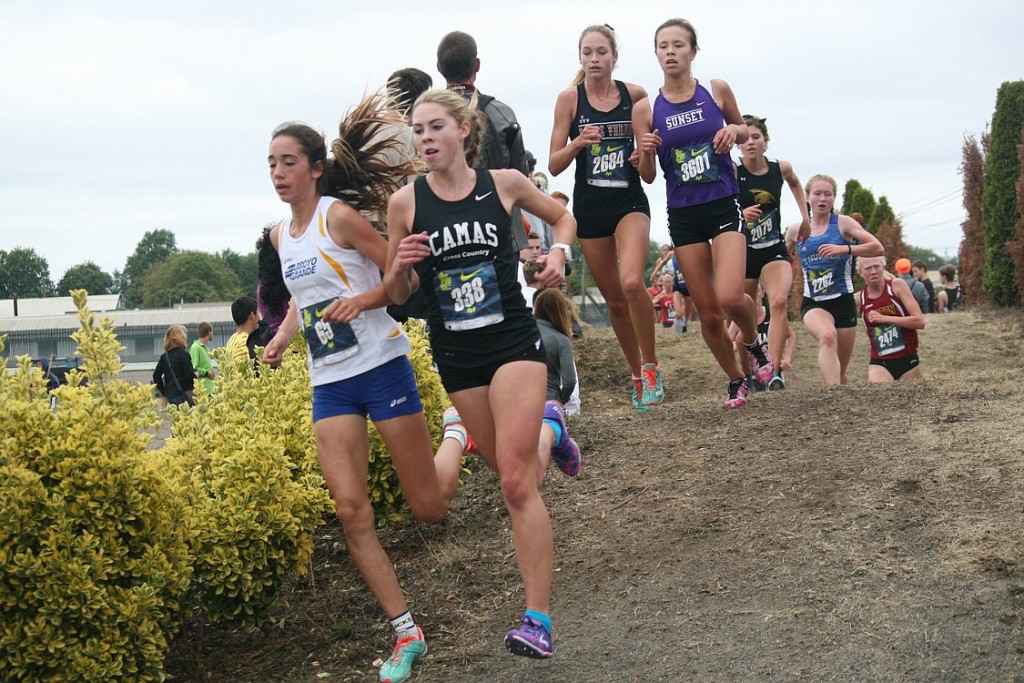 Alissa Pudlitzke attacks the hills during the Nike-Pre National Jim Danner Championship Saturday, at Portland Meadows. The Camas High School senior snagged 18th place to help the Papermakers claim eighth as a team.