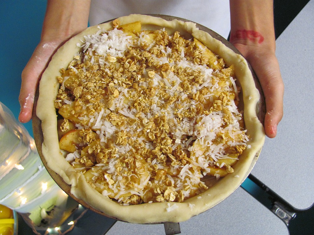 Danielle Frost/Post-Record
Apple pie is a signature fall dessert. Students taking classes at The Kids Cooking Corner learned how to make a simple version of the dish, which included coconut and granola topping.