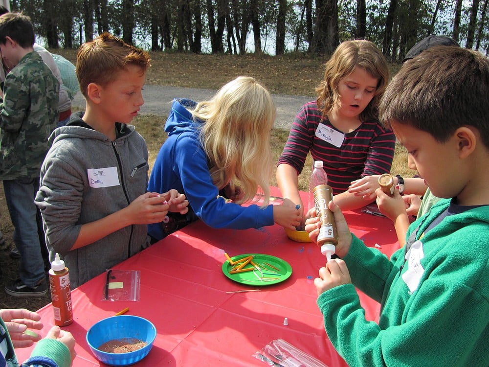 Grass Valley Elementary students make cactus fly refrigerator magnets out of recycled phone wires, straws and pipe cleaners.