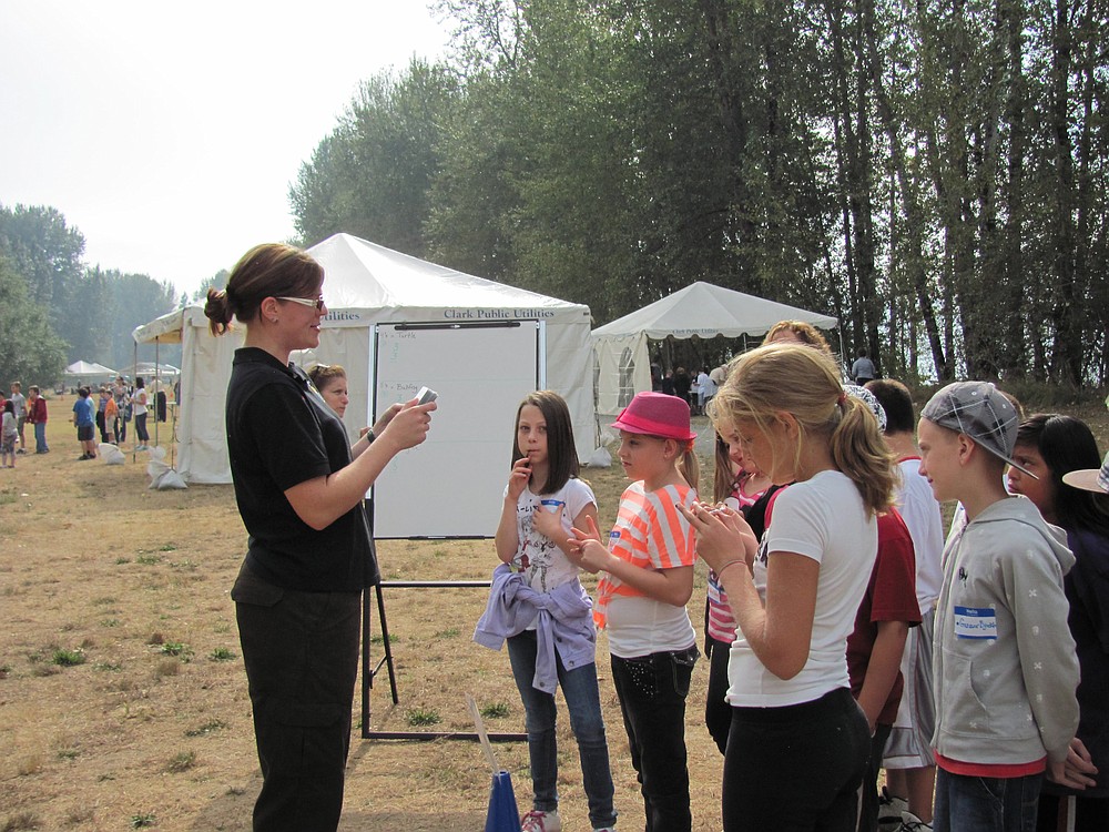 Hathaway Elementary students play a trivia game about their knowledge of invasive aquatic species.