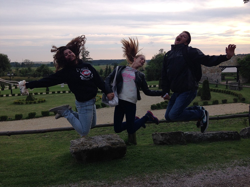 Abigail Engel and Carson Dunn share a fun moment with a Polish student during the English Language Camp in July. The trip also included tours and events in addition to teaching students and teachers conversational English.