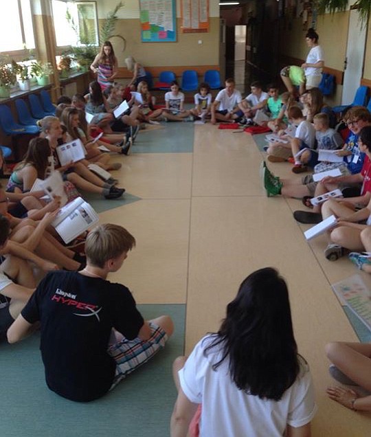 Polish students improve their conversational English skills with the help of volunteer teachers and students.